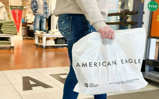 A person holding American Eagle shopping bags